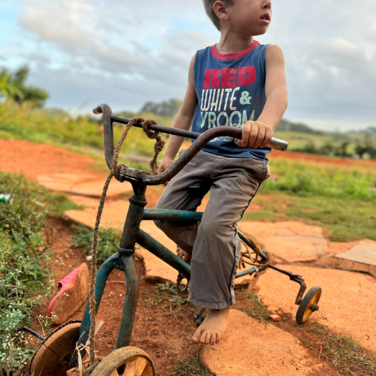 cuban boy on makeshift bike